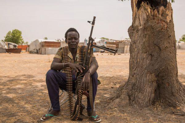 A government soldier poses with a gun in Leer, South Sudan, on March 7, 2017,. (Stefanie Glinski/AFP/Getty Images)