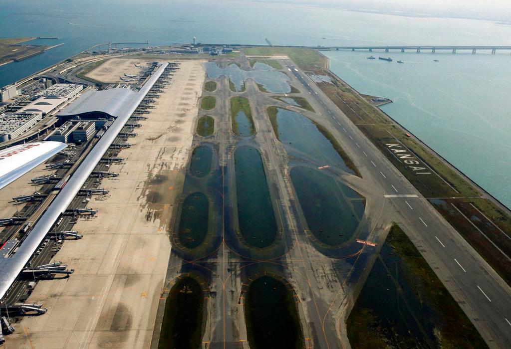 Kansai International Airport is partially flooded by Typhoon Jebi in Osaka, western Japan, Sept. 5, 2018. The powerful typhoon slammed into western Japan on Sept. 4, 2018, inundating the region's main international airport and blowing a tanker into a bridge, disrupting land and air travel and leaving thousands stranded. (Hiroko Harima/Kyodo News via AP)