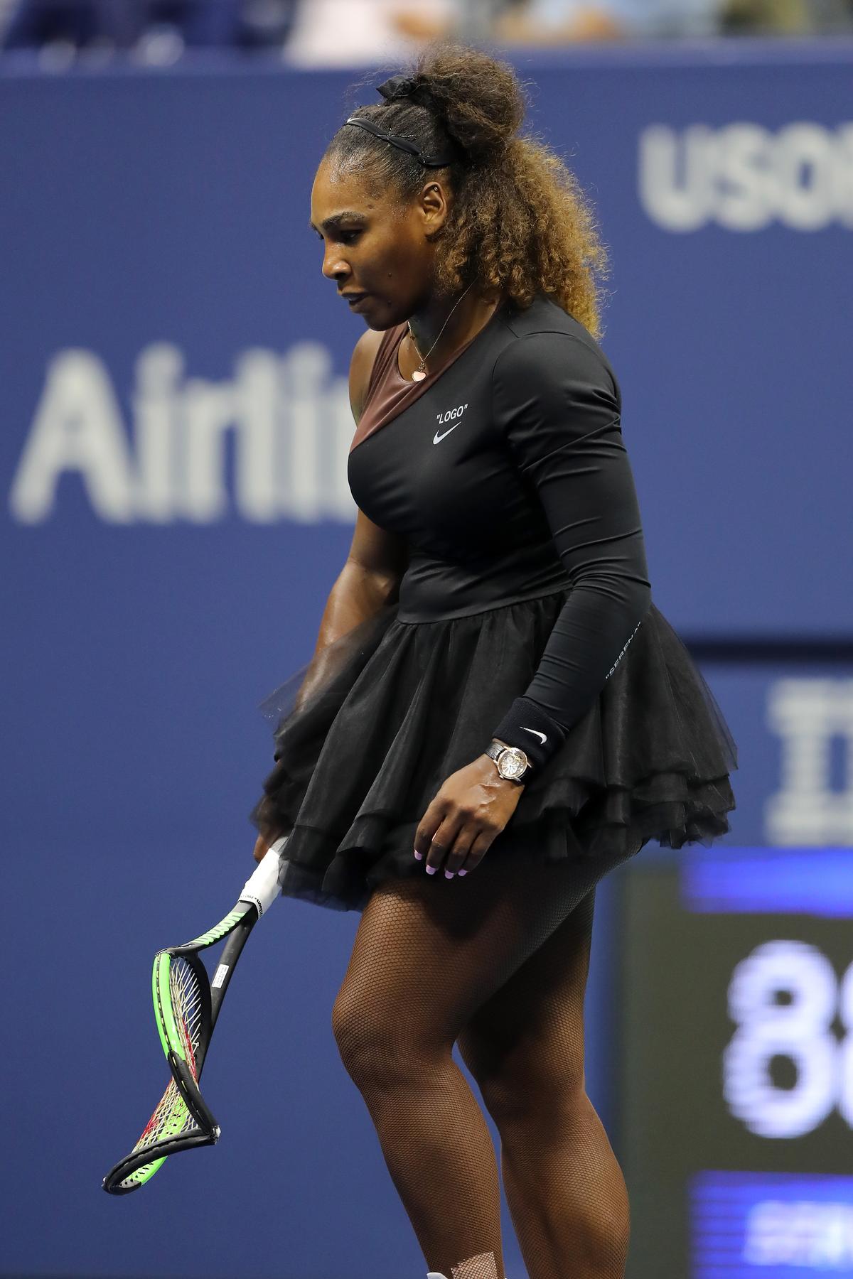 Serena Williams of the United States returns to her chair after smashing her racket during her Women's Singles finals match against Naomi Osaka of Japan during the 2018 US Open in New York City on Sept. 8, 2018. (Elsa/Getty Images)