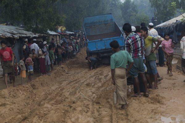A truck is stuck in the mud created by severe rain at Lombashia Camp in Cox’s Bazar, Bangladesh, on May 18, 2019. (Aungmakhai Chak/DEC)
