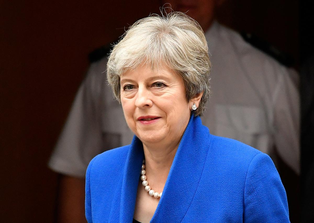 UK PM May Promises Timetable in June for Her Exit Date