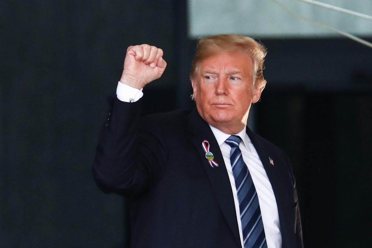 President Donald Trump pumps his fist at the Flight 93 September 11 Memorial Service in Shanksville, Pa., on Sept. 11, 2018. (Samira Bouaou/The Epoch Times)