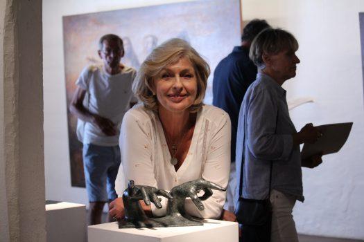 Sculptor Maud Lewenhaupt du Jeu behind one of her pieces at the opening of the exhibition ”It’s about us” at the Krapperup art gallery, on June 30, 2018. (Susanne W. Lamm/ The Epoch Times)