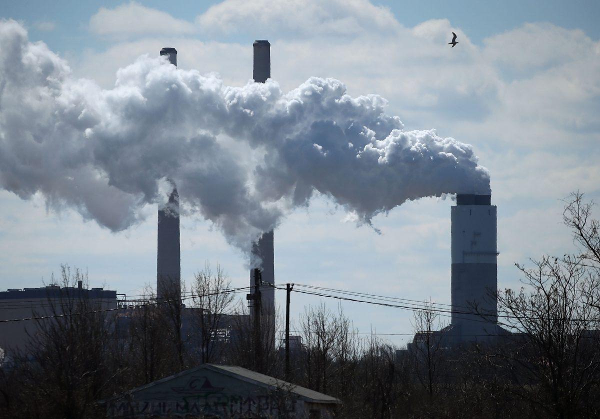 Smoke emerges from a large stack at the coal-fired Brandon Shores Power Plant in Baltimore, Md., on March 9, 2018. (Mark Wilson/Getty Images)