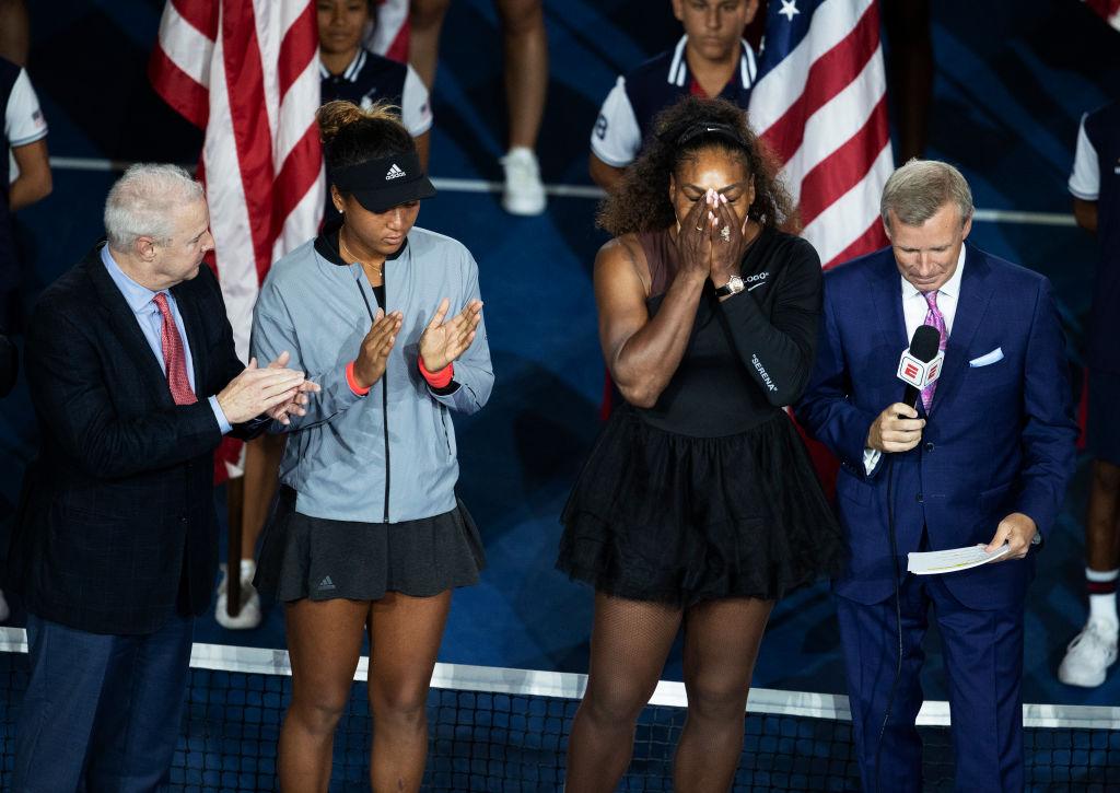 Serena Williams of the United States (2nd R), while being interviewed after her defeat in the Women's Singles finals match to Naomi Osaka (2nd L),  of Japan at the 2018 U.S. Open at the USTA Billie Jean King National Tennis Center in New York City on Sept. 8, 2018. (Al Bello/Getty Images)