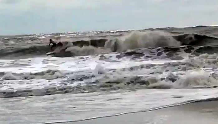 Video: Surfers Hit Hurricane Florence Storm Surge in South Carolina