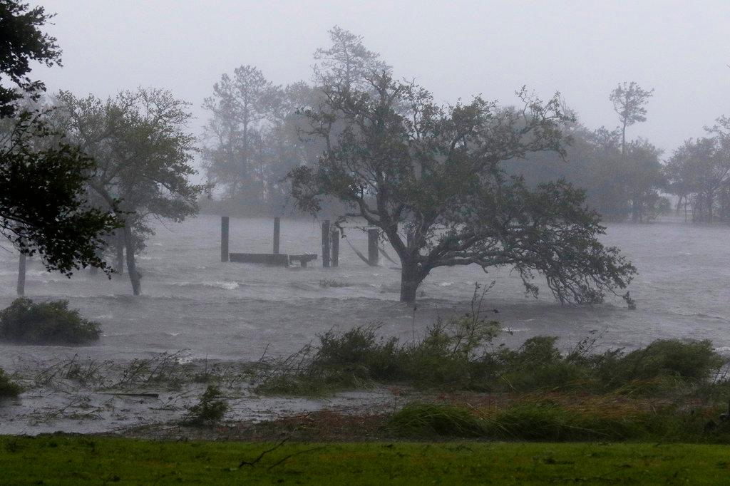 High winds and storm surge from Hurricane Florence hits Swansboro N.C., on Sept. 14, 2018. (AP Photo/Tom Copeland)