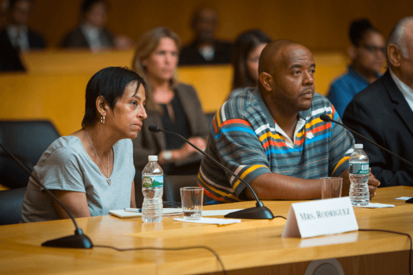 Evelyn Rodriquez (L) and Robert Mickens during a congressional hearing on MS-13 gang violence in Central Islip, Long Island, N.Y., on June 20, 2017. (Benjamin Chasteen/The Epoch Times)