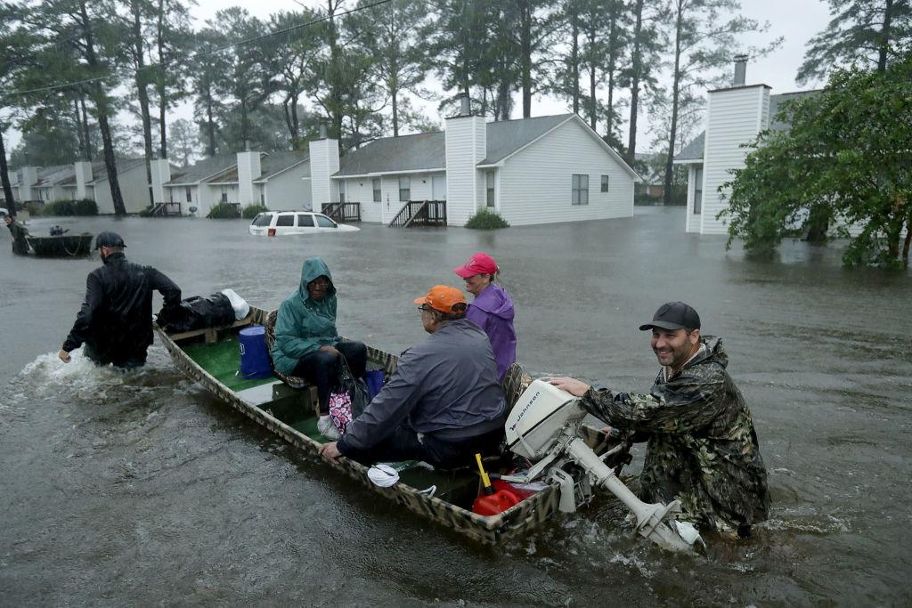Volunteers from all over North Carolina help rescue residents and their pets from their flooded homes during Hurricane Florence in New Bern, North Carolina, on Sept. 14, 2018. (Photo by Chip Somodevilla/Getty Images)