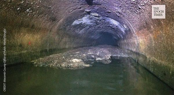 The fatberg under Macomb County stretched 100 feet long and six feet tall, and weighed about 19 tons. (Macomb County Office of Public Works via Storyful screenshot))