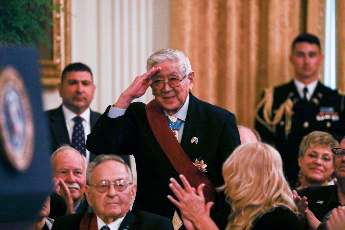Korean War veteran Hiroshi Miyamura salutes President Donald Trump at the Congressional Medal of Honor Society Reception in the East Room at the White House in Washington on Sept. 12, 2018. (Charlotte Cuthbertson/The Epoch Times)