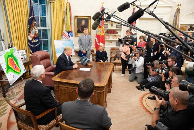 President Donald Trump meets with FEMA Administrator Brock Long and Homeland Security Secretary Kirstjen Nielsen to discuss Hurricane Florence in the Oval Office on Sept. 11, 2018. (Official White House photo by Joyce N. Boghosian)