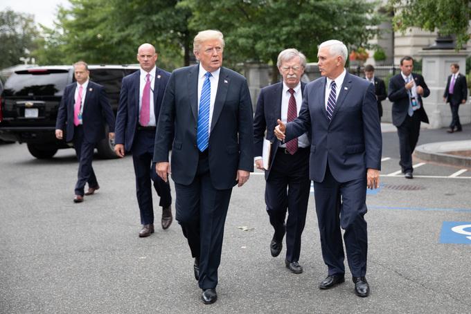 President Donald Trump, Vice President Mike Pence (R), and National Security Advisor John Bolton walk back to the White House after a meeting with the National Security Council’s Resilience Directorate on Sept. 13, 2018. (Official White House photo by Joyce N. Boghosian)
