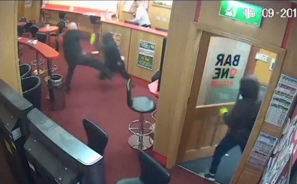 CCTV footage captures the moment that Denis O'Connor, 83, tackles a robber at the Bar One book keeper store in Cork, Ireland, on Sept. 15, 2018. (Bar One Racing via Storyful)