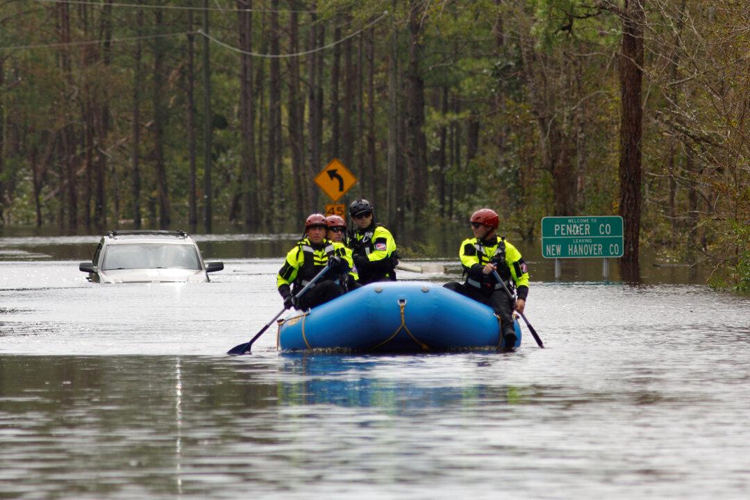 Florence’s Drenching Rains Kill 23 in the Carolinas
