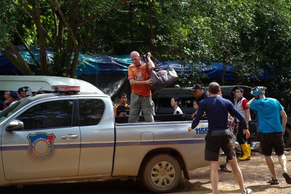 British caver Vernon Unsworth gets out of a pickup truck near the Tham Luang cave complex, where 12 boys and their soccer coach were trapped, in the northern province of Chiang Rai, Thailand on July 5, 2018. (Panu Wongcha-um/Reuters)