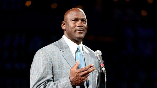 Michael Jordan, owner of the Charlotte Bobcats, unveils the new logo for team’s name change to “The Hornets” during their game at Time Warner Cable Arena on Dec. 21, 2013. (Streeter Lecka/Getty Images)