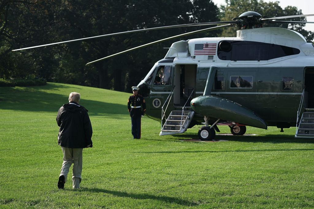 President Donald Trump walks toward Marine One outside the White House en route to see the damage from Hurricane Florence in the Carolinas on Sept. 19, 2018. (Alex Wong/Getty Images)