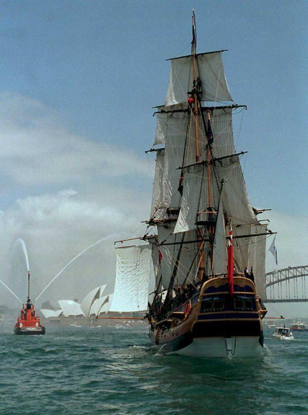 A replica of Captain James Cook's three-masted bark "Endeavour" enters Sydney Harbor, Australia on Dec. 18, 1994. (Torsten Blackwoo/AFP/Getty Images)