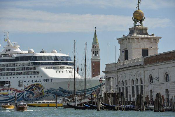 A cruise ship arrives in the harbor and passes close to the church San Giorgio Maggiore, in Venice on Sept. 26, 2014. (Andreas Solaro/AFP/Getty Images)
