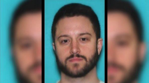 A photograph of Cody Wilson included in a Wanted notice circulated by the U.S. authorities. (U.S. Department of Justice, U.S. Marshals Service)