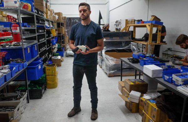 Cody Wilson holds a 3D printed gun, called the "Liberator," in his factory in Austin, Texas, on Aug. 1, 2018. (Kelly West/AFP/Getty Images)