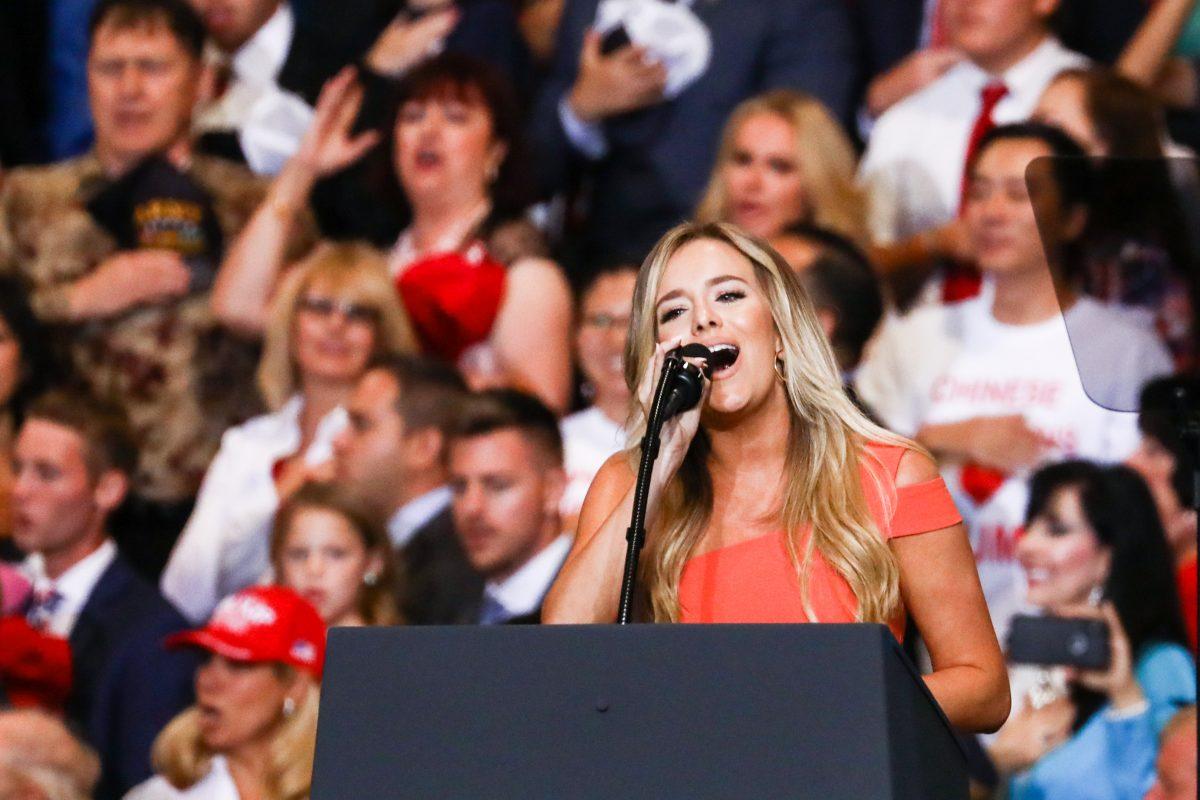 Sierra Black sings the national anthem at President Donald Trump’s Make America Great Again rally in Las Vegas, Nev., Sept. 20, 2018. (Charlotte Cuthbertson/The Epoch Times)
