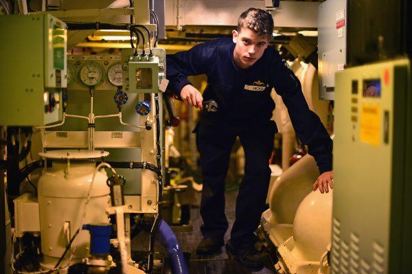 A crew member aboard the HMS Vigilant nuclear submarine in Rhu, Scotland, on Jan. 20, 2016. (Jeff J Mitchell/Getty Images)