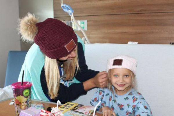 Love Your Melon continues to provide every child diagnosed with cancer in the U.S. with one of the company’s beanies and now are focused on providing their hats to pediatric cancer patients around the world. (Courtesy of Love Your Melon)