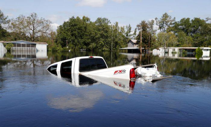 When Will It End? Florence’s Floodwaters Rising in Carolinas