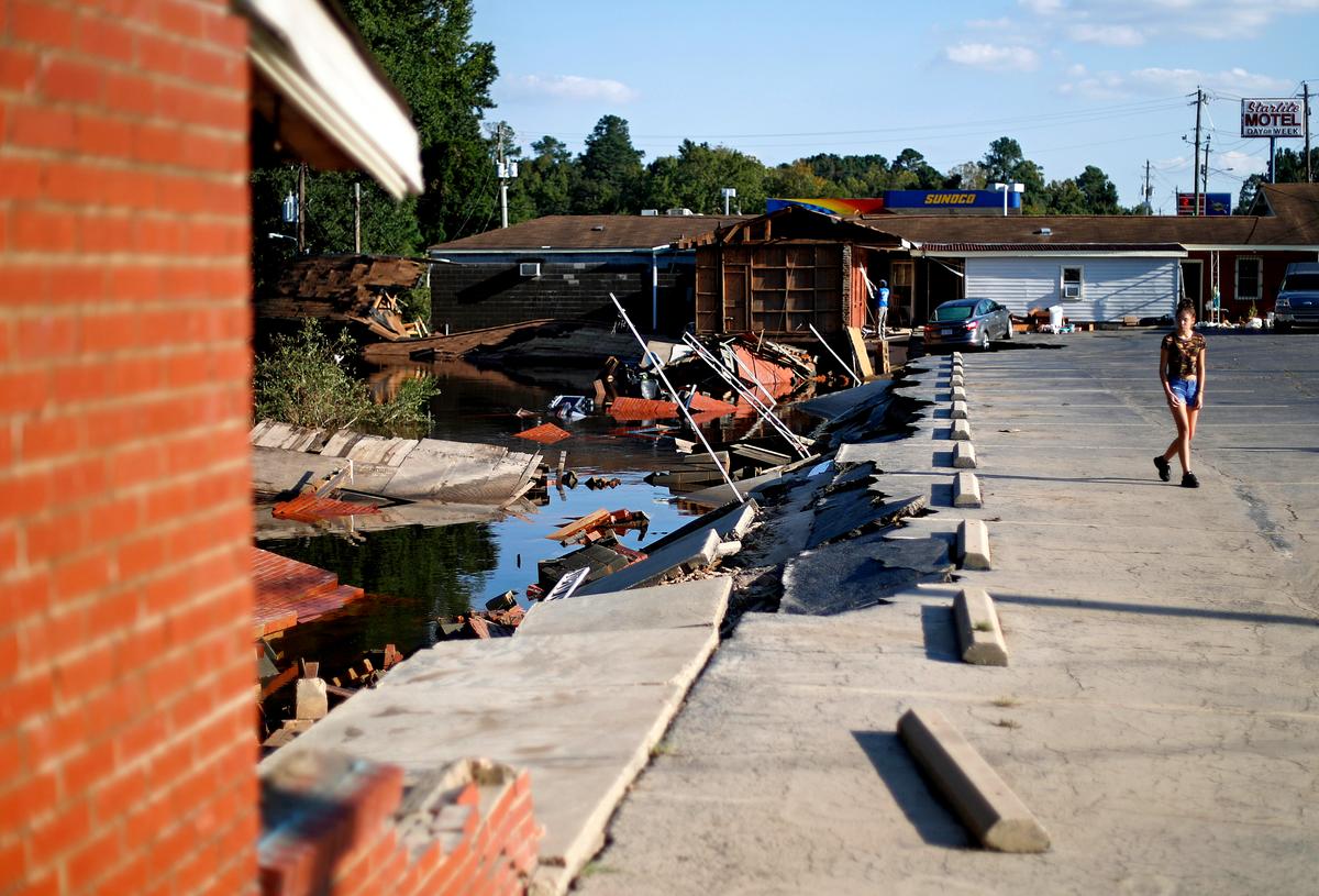 Part of the Starlite Motel is washed away in the aftermath of flooding from Hurricane Florence in Spring Lake, N.C. Florence washed away half the rooms at the Starlite Motel ripping away the livelihood of a family that bought it in recent months. Sept. 19, 2018 (AP Photo/David Goldman, File photo)