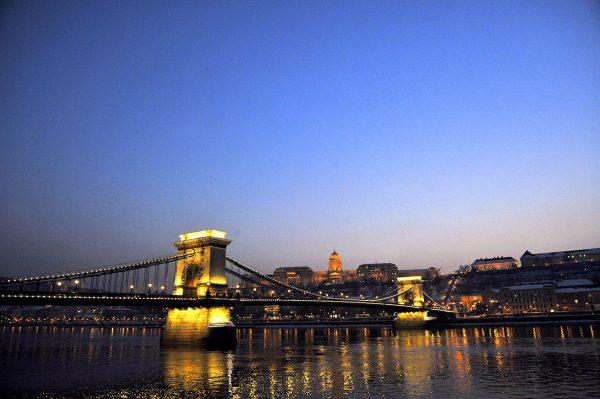 Hungary's oldest bridge, the Chain Bridge (Lanchid), over the Danube River in downtown Budapest. In the background stands the Buda Palace. (ATTILA KISBENEDEK/AFP/Getty Images)