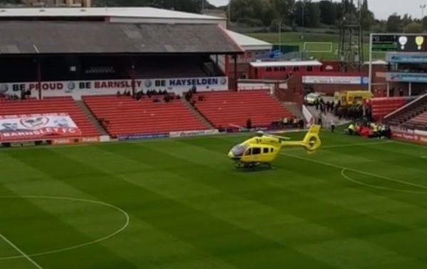 An air ambulance lands at Oakwell stadium in Barnsley, South Yorkshire, England on Sept. 22, 2018. (Danny Stewart via Storyful)