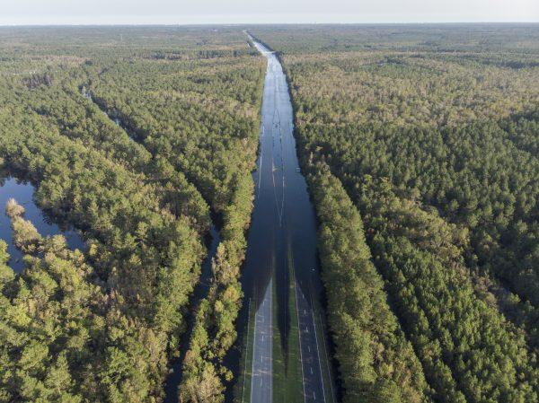 S.C. Highway 22 is flooded between SC-90 and SC-905 on Saturday, Sept. 22, 2018. The blocked road has traffic snarled around Conway, S.C. (Jason Lee/The Sun News via AP)