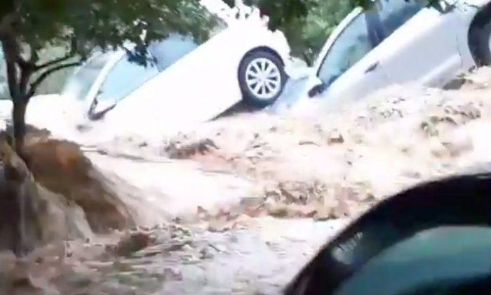 Video: Flash Floods Sweep Cars Down Streets in Tunisia