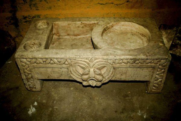 This undated photo released by the Egyptian Ministry of Antiquities, shows a basin in a chamber that was likely used for religious rituals, that was recently discovered in the town of Mit Rahina, 12 miles (20 kilometers) south of Cairo, Egypt. (Egyptian Ministry of Antiquities via AP)