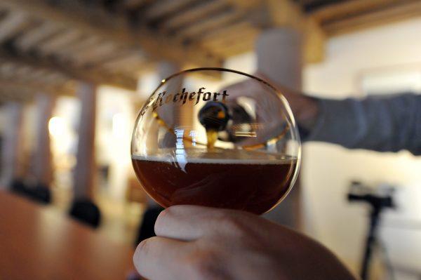 Trappist beer is served in a glass at a brewery in southeast of Brussels, Belgium, in this file photo. (Georges Gobet/AFP/Getty Images)