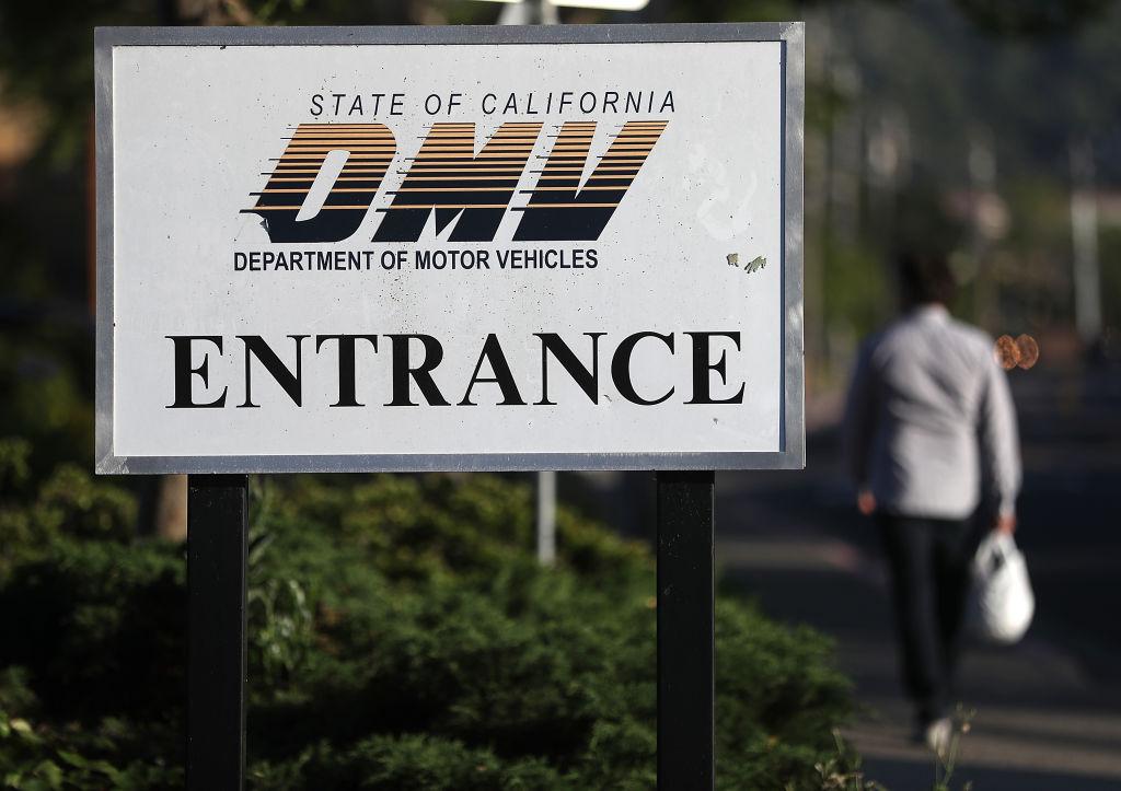 A sign is posted in front of a California Department of Motor Vehicles (DMV) office in Corte Madera, Calif., on May 9, 2017. (Justin Sullivan/Getty Images)