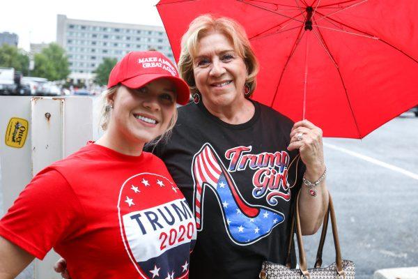 Breanna (L) and Denise Hughes line up before Trump's Make America Great Again rally in Springfield, Mo., Sept. 21, 2018. (Charlotte Cuthbertson/The Epoch Times)
