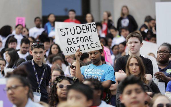 Destiny Charter Middle School students take part in a rally to support charter schools in Olympia, Washington, on May 17, 2018. (Ted S. Warren/AP Photo)
