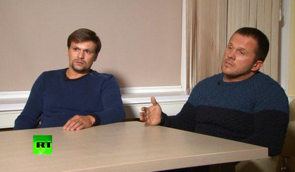 Ruslan Boshirov (L) and Alexander Petrov attend their first public appearance in an interview with the RT channel in Moscow, Russia, in this video grab provided by the RT channel on Sept. 13, 2018. (RT channel video via AP)