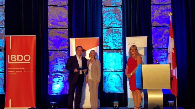Canada’s Angel of the Year Award for 2018 goes to Randy Stewart Thompson as presented by Michelle Scarborough from BDC and Jess Joss, chair of the World Angel Investment Summit (far right) on Sept. 26 in Toronto. (Courtesy NACO)