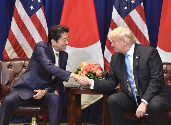 Japanese Prime Minister Shinzo Abe (L) meets with US President Donald Trump, on the sidelines of the United Nations General Assembly (UNGA) in New York on Sept. 26, 2018. (NICHOLAS KAMM/AFP/Getty Images)