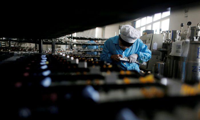 China Factory Growth Cooling As US Trade Dispute Intensifies