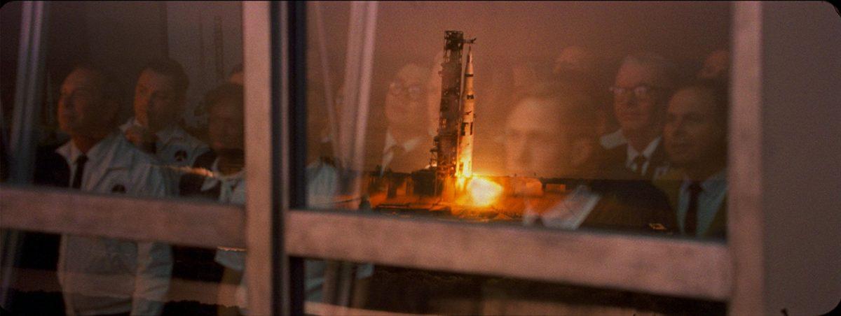 The Gemini rocket team watch liftoff in “First Man.” (Universal Pictures)