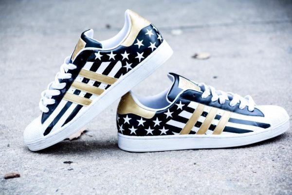 The Brooklyn artist Tiffany B. Chanel displays her sneaker art, "Abstract America," in black, gold, and white. (Courtesy of Mister Rowley)