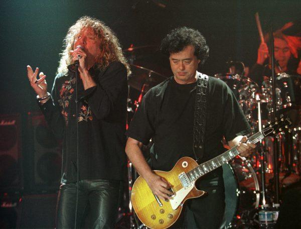 Led Zeppelin's Robert Plant (L), performs with guitarist Jimmy Page during their concert in Istanbul, on March 5, 1998. (Murad Sezer/AP)