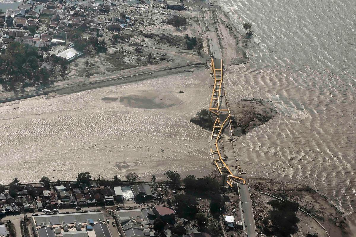 An aerial view shows bridge damaged by an earthquake and tsunami in Palu, Central Sulawesi, Indonesia Sept. 29, 2018. (By Antara Foto/Muhammad Adimaja/Reuters)