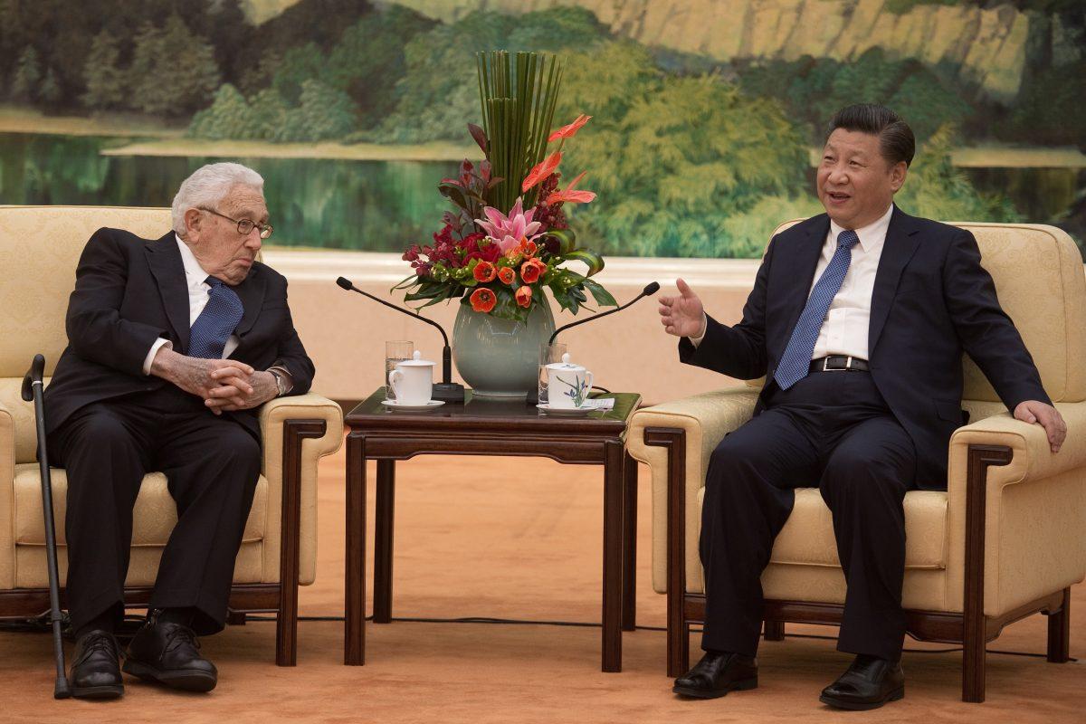 Former U.S. Secretary of State Henry Kissinger (L) meets Chinese leader Xi Jinping (R) at the Great Hall of the People in Beijing, on Dec. 2, 2016. (Nicolas Asouri-Pool /Getty Images)