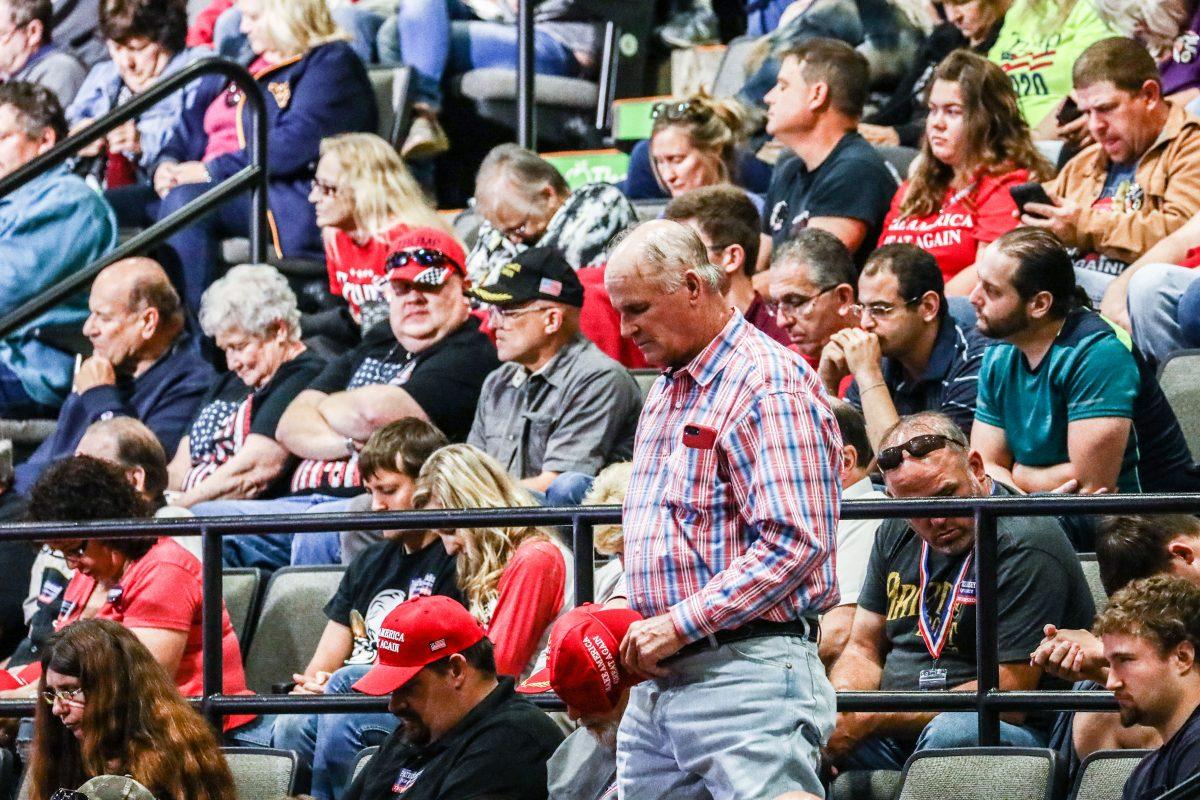 Audience members during a prayer at a Make America Great Again rally in Wheeling, West Va., on Sept. 29, 2018. (Charlotte Cuthbertson The Epoch Times)